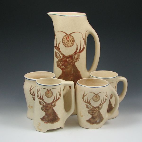 Appraisal: Roseville Creamware Elks tankard set with four mugs each of