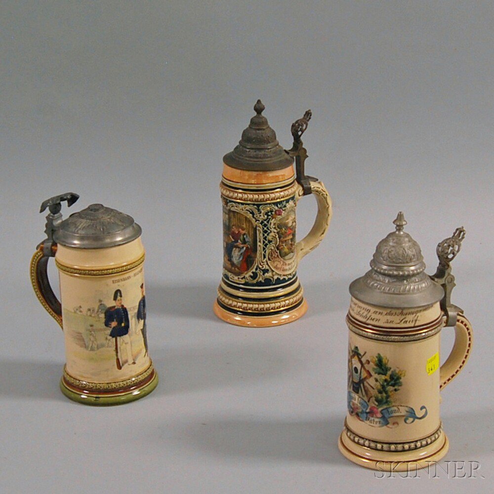 Appraisal: Three German Stoneware Steins th century two with beaded and