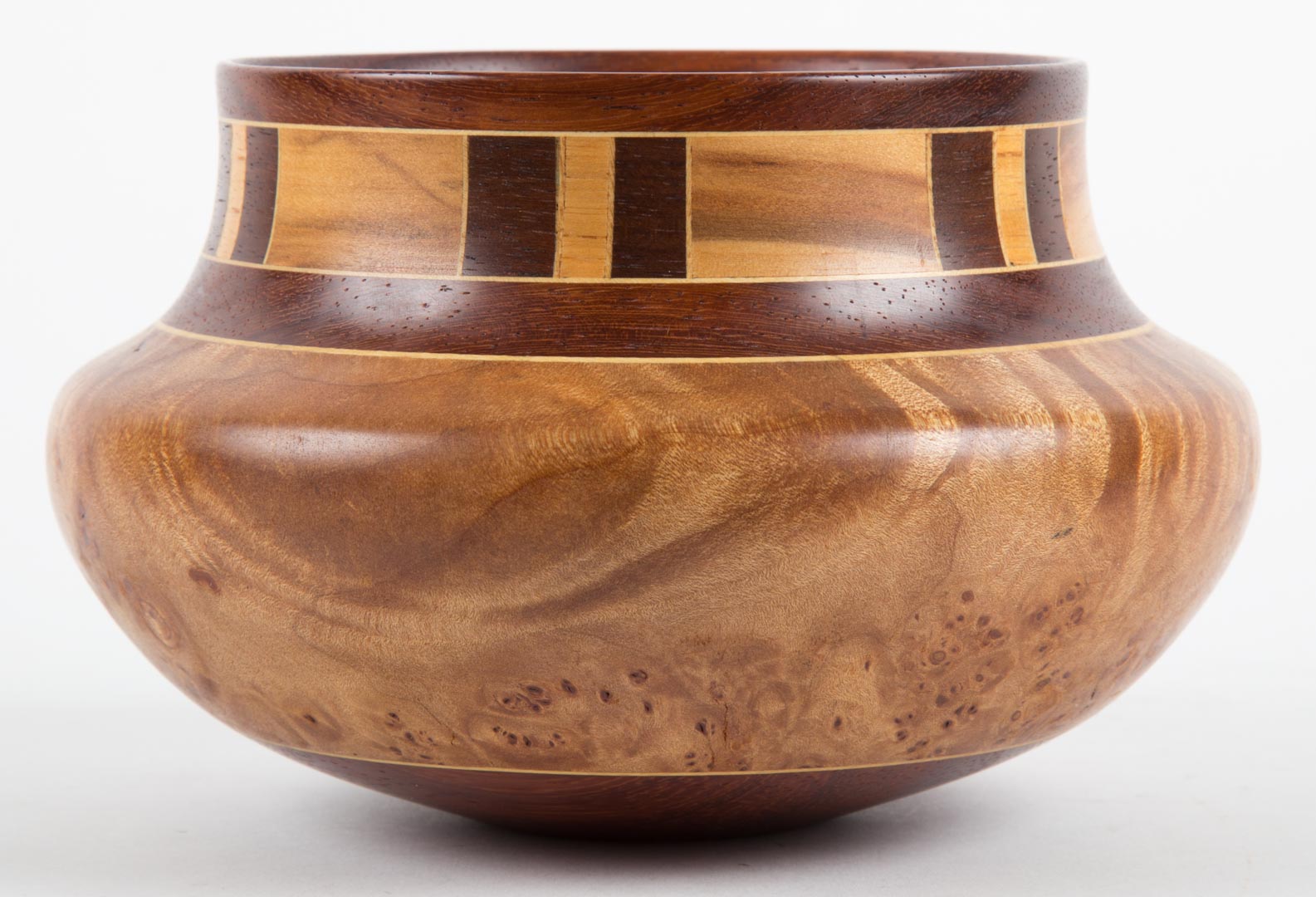 Appraisal: Addie Draper wooden vessel American Contemporary Burl maple and gum