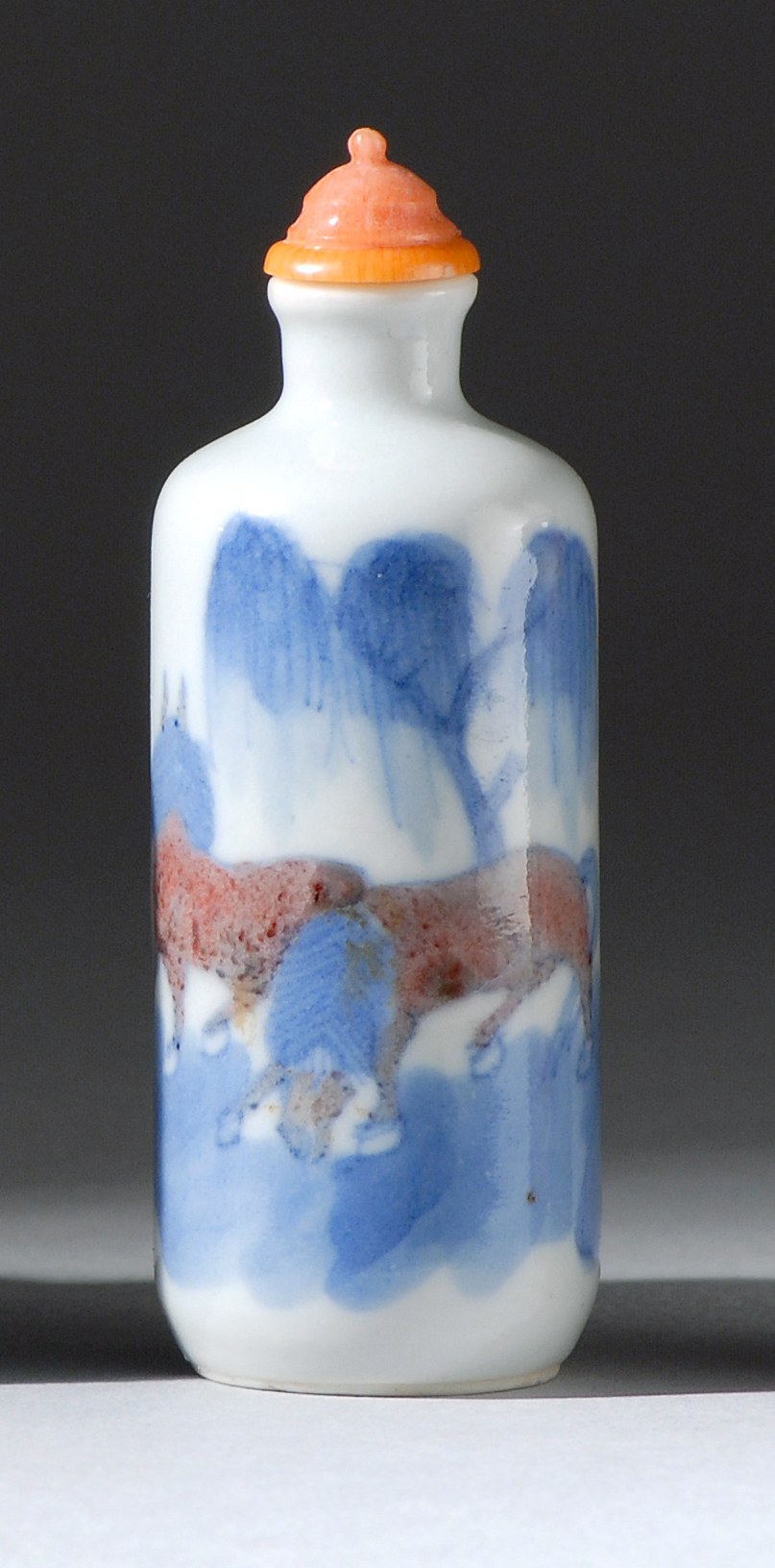 Appraisal: UNDERGLAZE RED AND BLUE PORCELAIN SNUFF BOTTLE Circa With decoration