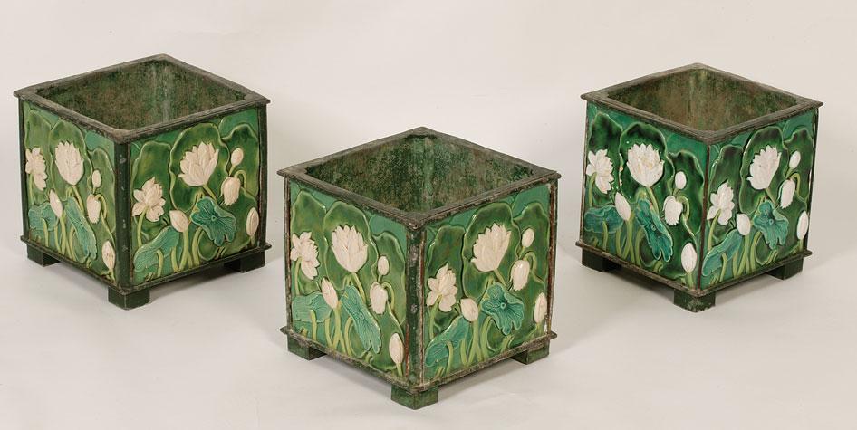 Appraisal: A SET OF THREE VICTORIAN MAJOLICA CONSERVATORY JARDINIERES the green