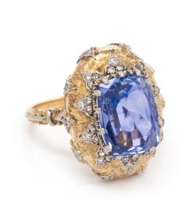 Appraisal: A Platinum Yellow Gold Sapphire and Diamond Ring Buccellati dwts