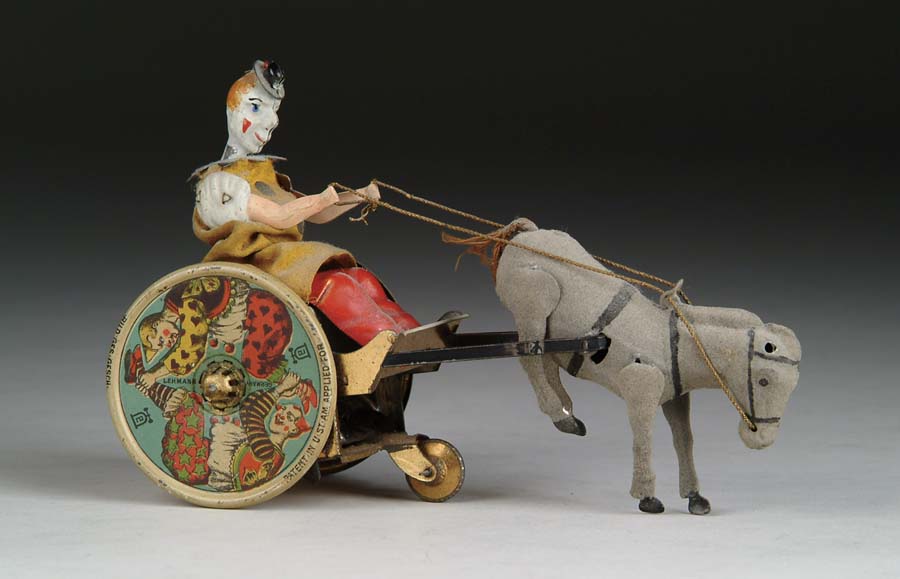 Appraisal: LEHMANN BALKY MULE Germany Colorfully dressed clown in cart with