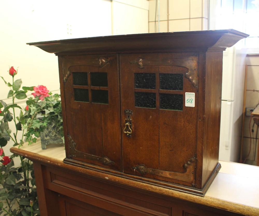 Appraisal: SCOTTISH ARTS AND CRAFTS OAK CABINET early th century a