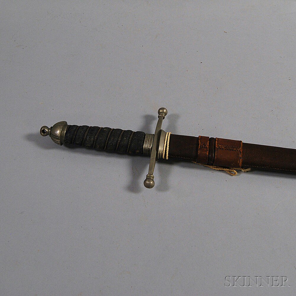 Appraisal: Scottish Sword and Scabbard the blade decorated with foliate motifs