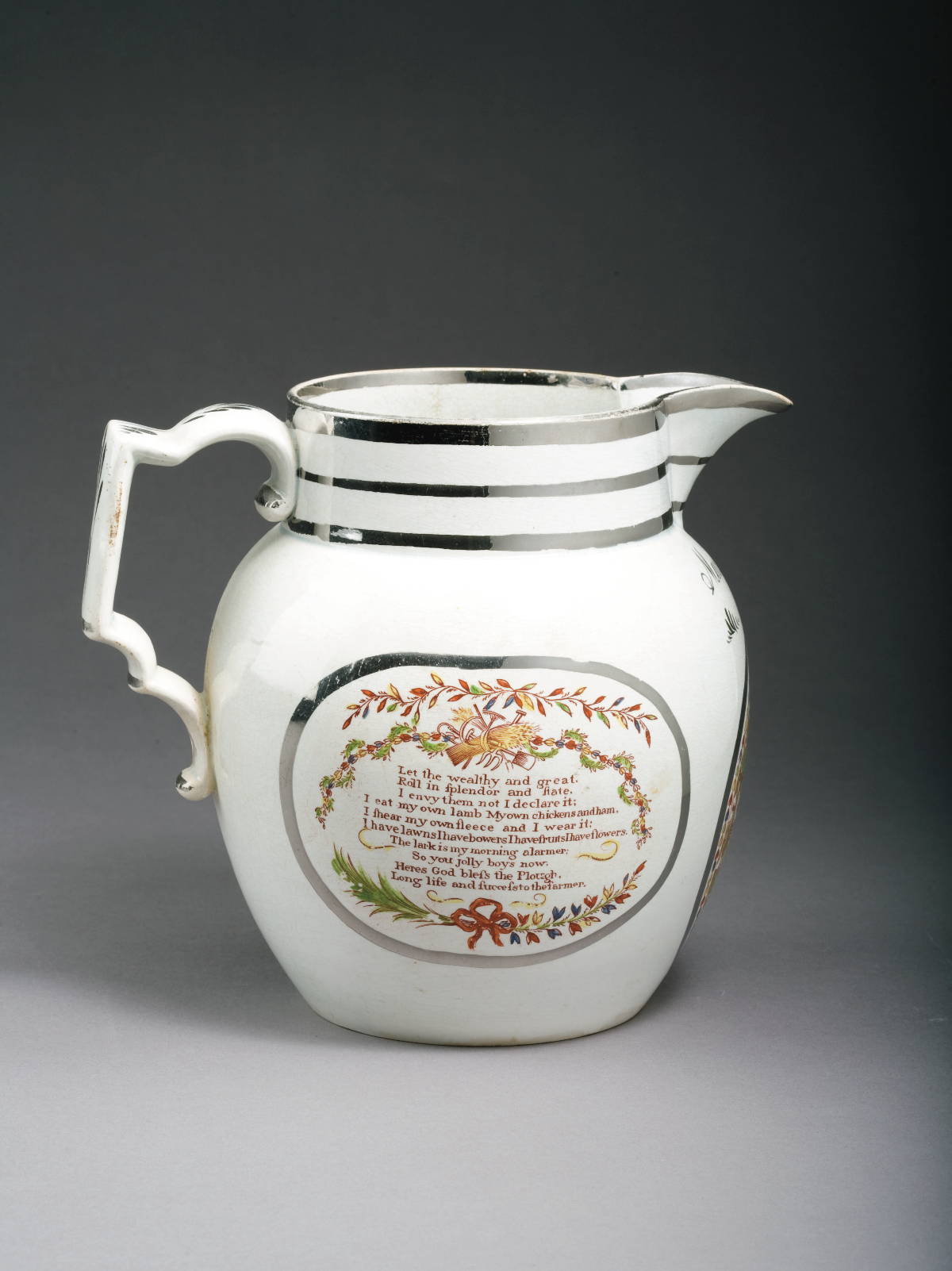 Appraisal: BRITISH PEARLWARE SILVER LUSTRE ENAMEL-DECORATED AND POLYCHROME TRANSFER-PRINTED PRESENTATION JUG