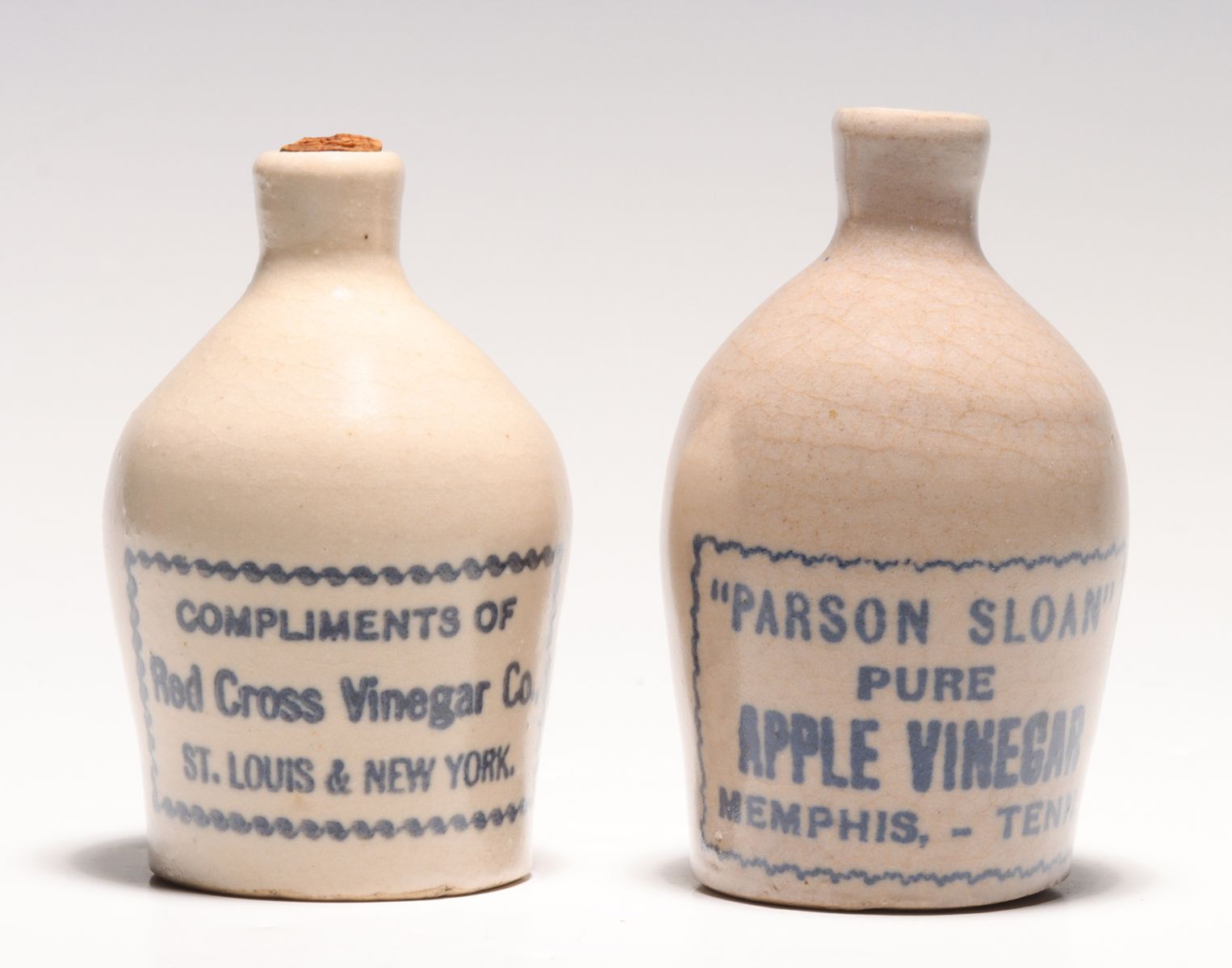 Appraisal: TWO VINEGAR ADVERTISING STONEWARE MINI JUGSThe condition is as shown