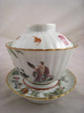 Appraisal: A Chinese porcelain famille rose tea bowl saucer and cover