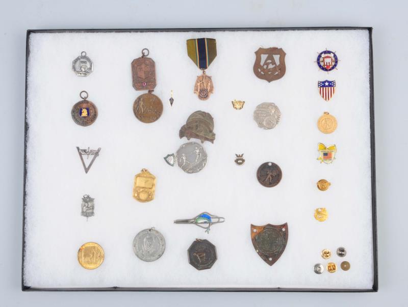 Appraisal: Lot Of Vintage Medals Pins Includes relay racer medal made