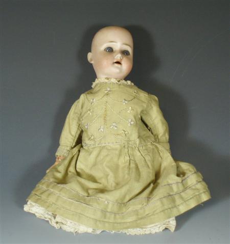 Appraisal: A bisque headed doll circa By Schone Hoffmeister Germany with