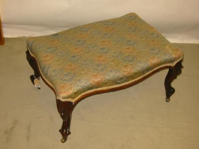 Appraisal: AN EARLY VICTORIAN ROSEWOOD STOOL of serpentine oblong form upholstered