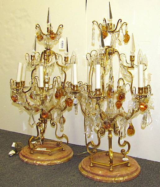 Appraisal: A pair of Louis XV style gilt bronze amber and