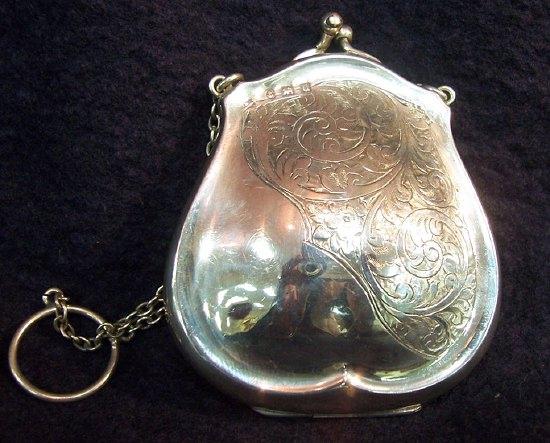 Appraisal: A lady's purse engraved scrolling acanthus with leather interior Birmingham