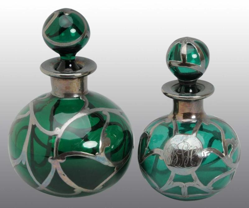 Appraisal: Lot of Sterling Silver Overlay Bottles Description Both green glass