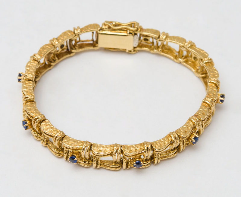 Appraisal: K GOLD AND SAPPHIRE BRACELET Set with round sapphires weighing