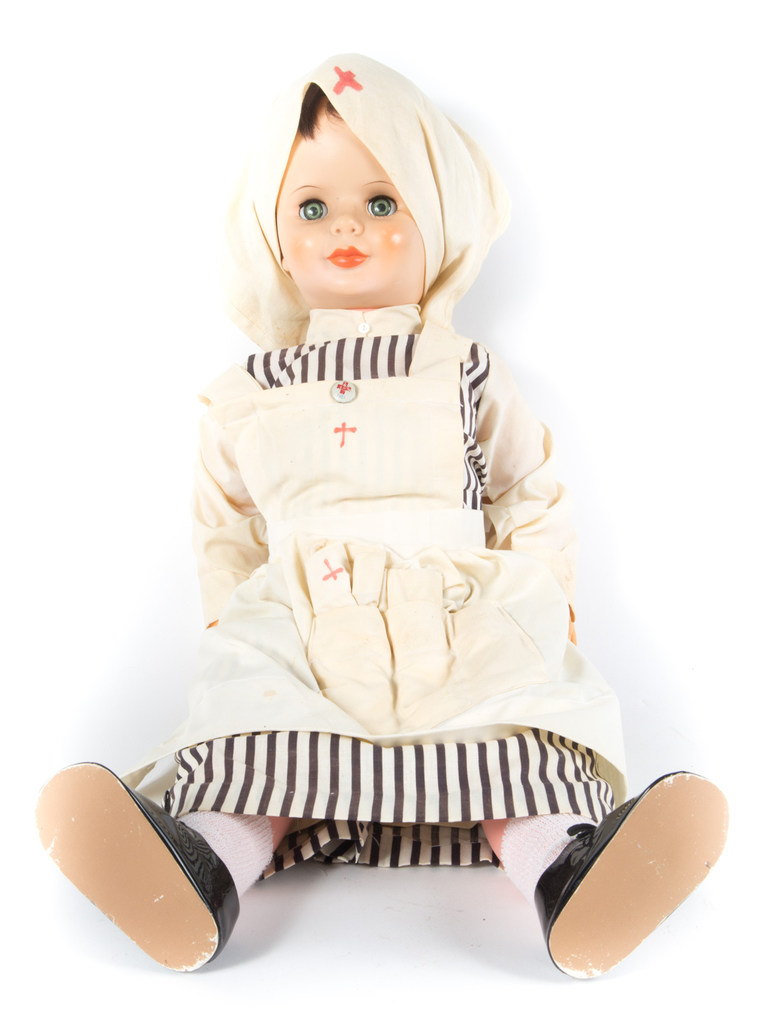 Appraisal: Modern plastic doll in WWI nurse outfit in L Condition