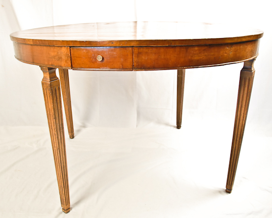 Appraisal: A Round Fruitwood Table with Inlaid Top the top with