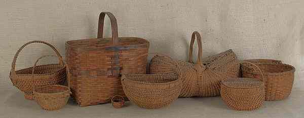 Appraisal: Nine miscellaneous baskets to include a splint oak basket with