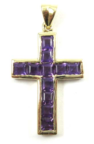 Appraisal: AMETHYST AND FOURTEEN KARAT GOLD PENDANT The cross pendant features