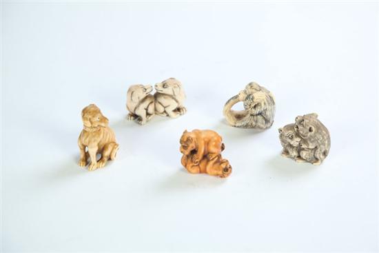 Appraisal: FIVE NETSUKES Japan th century ivory Two dogs tigers and