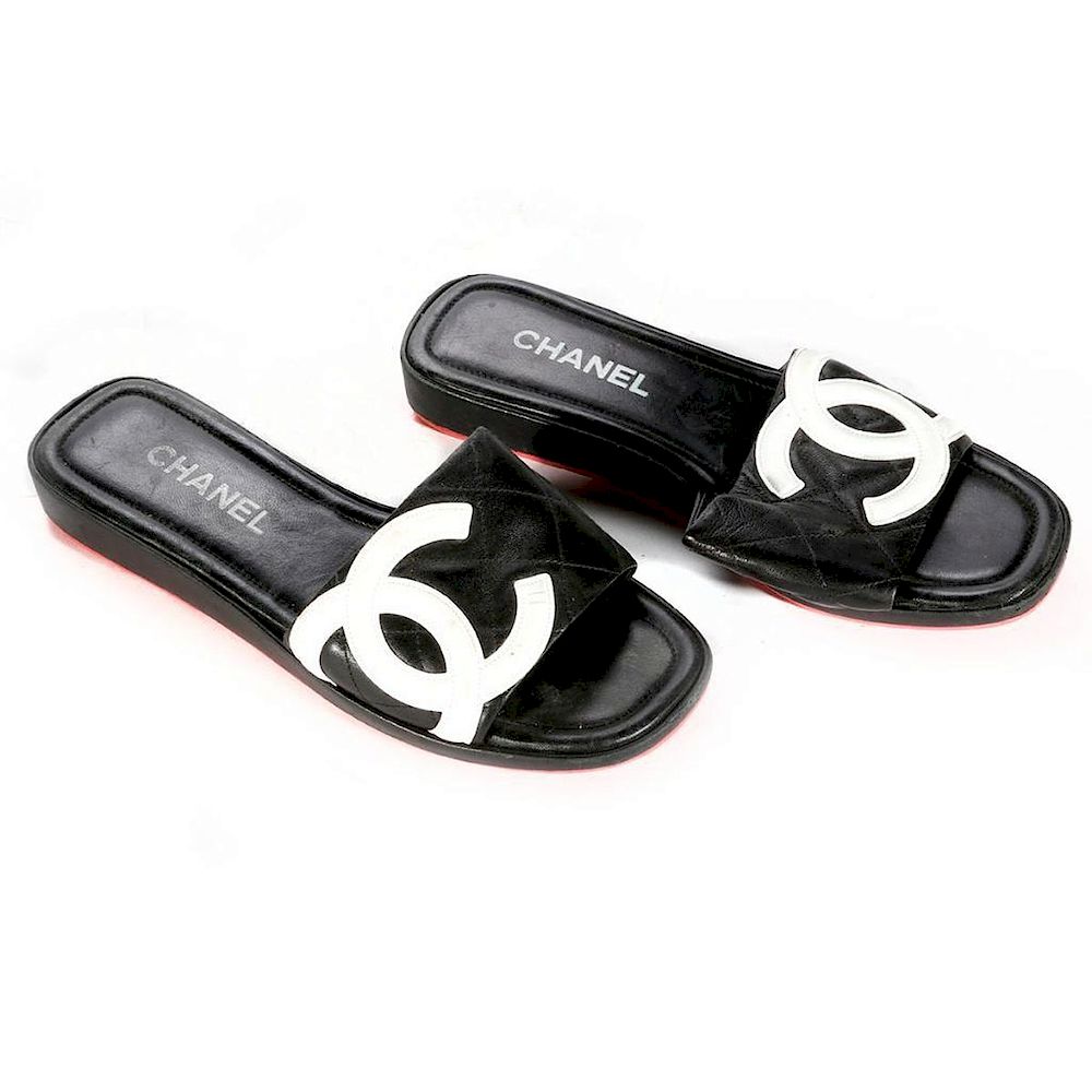 Appraisal: Chanel Shoes Chanel black leather sandals with white Chanel logo