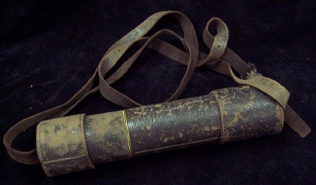 Appraisal: A leather cased four-draw telescope cm long extended