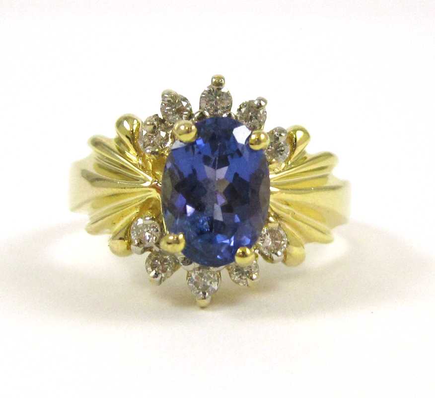 Appraisal: FOURTEEN KARAT GOLD LEVIAN RING having an oval-cut tanzanite weighing