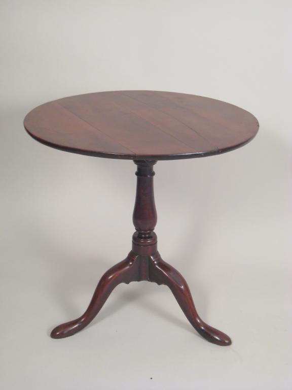 Appraisal: A Georgian yew wood Pillar Table with circular top on