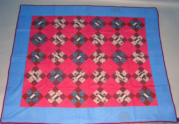 Appraisal: Nine patch quilt Pink and red with blue border and