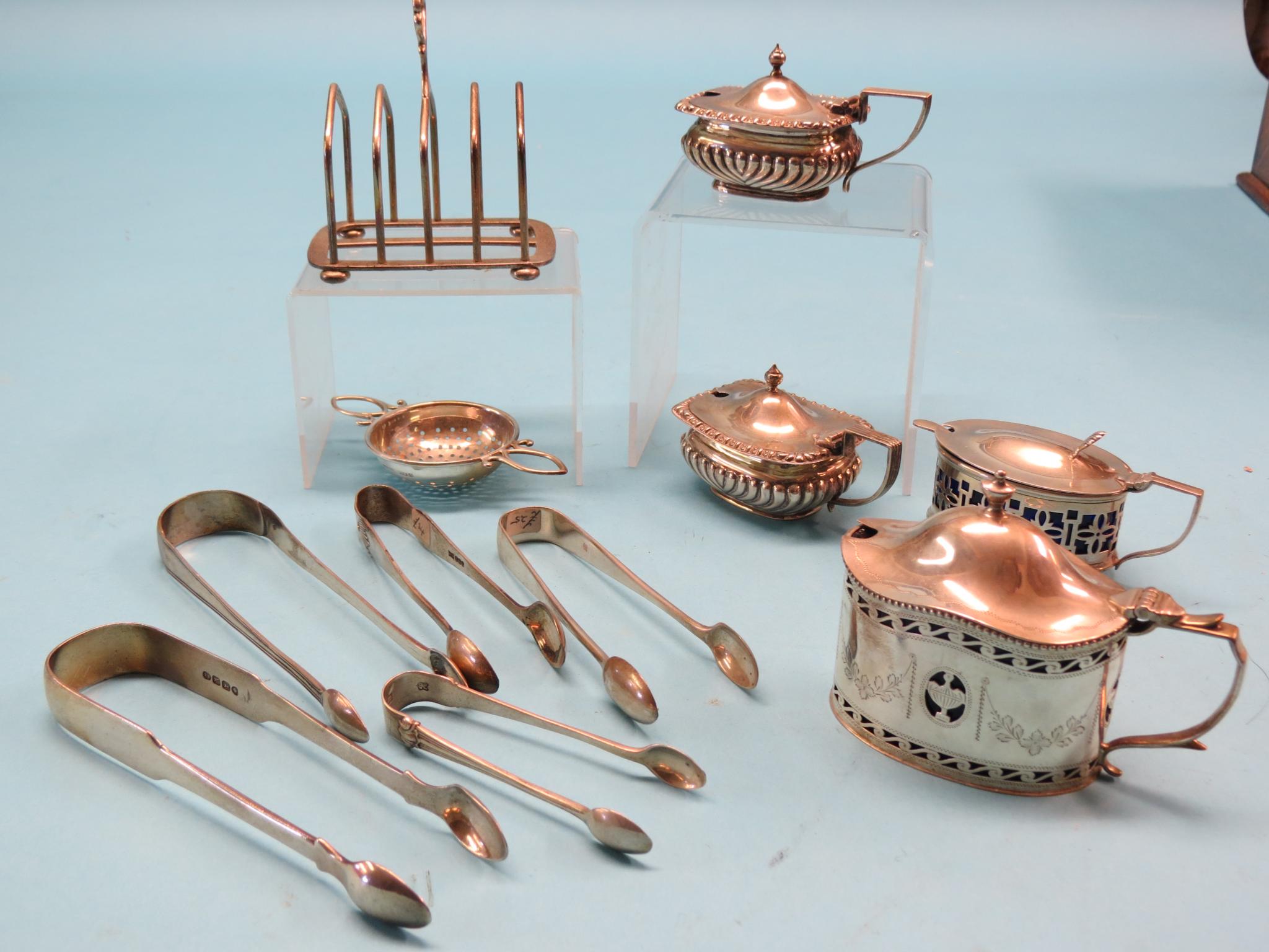 Appraisal: Small silver tableware four mustard pots five various sugar tongs