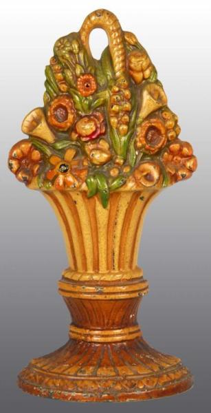 Appraisal: Cast Iron Mixed Flowers Doorstop Description Marked and numbered CC