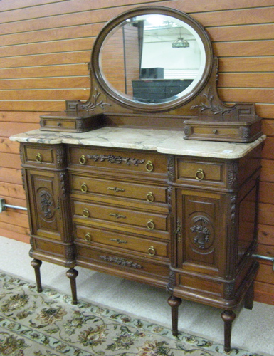 Appraisal: LOUIS XVI STYLE WALNUT DRESSER Continental c having an oval