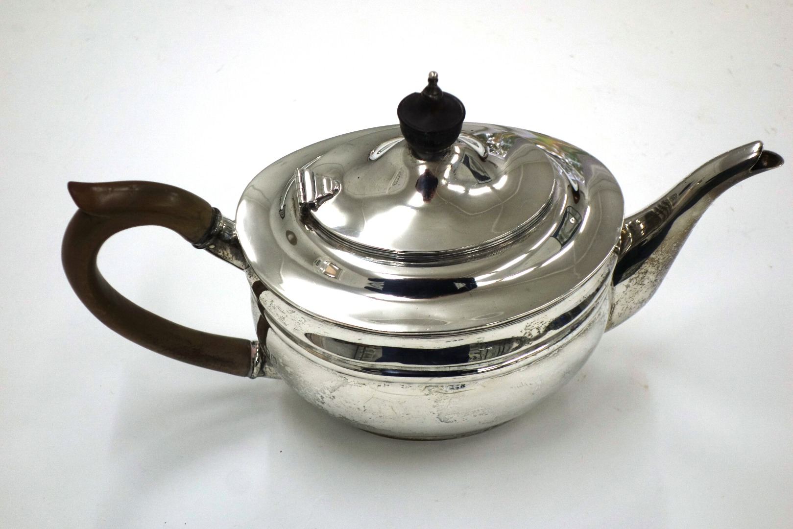 Appraisal: A George III style oval silver teapot Charles Stuart Harris