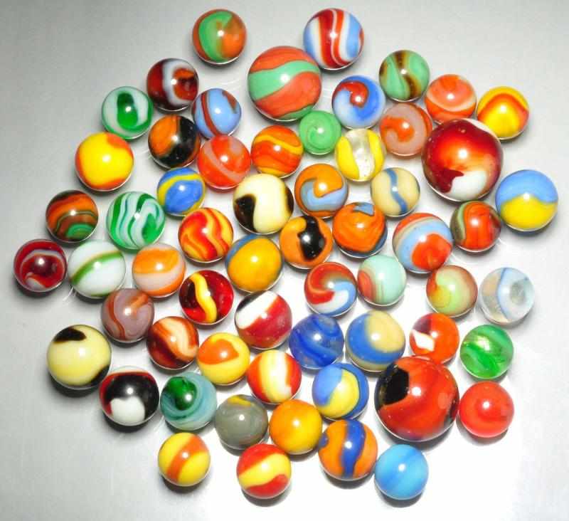 Appraisal: Lot of Akro Corkscrew Marbles Description Includes two and three