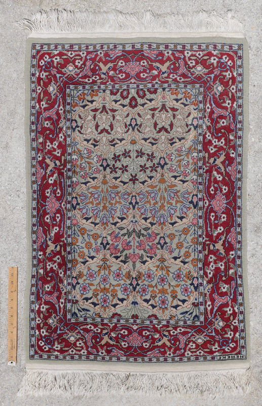 Appraisal: APPROX - YR OLD TURKISH HEREKE HAND KNOTTED WOOL RUG