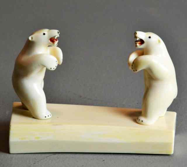 Appraisal: A Fine Inuit Ivory StatueDepicting two standing polar bears with