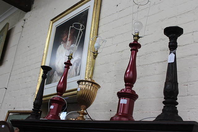 Appraisal: A PAIR OF CARVED WOODEN CANDLESTICKS high together with two