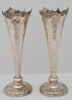 Appraisal: PAIR OF GORHAM MONOGRAMMED SILVER VASE HOLDERS Bearing date mark