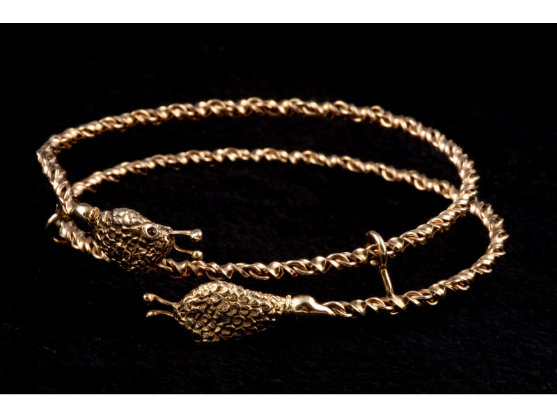 Appraisal: k Yellow Gold Snake Bangle Bracelet fabricated fitted with two