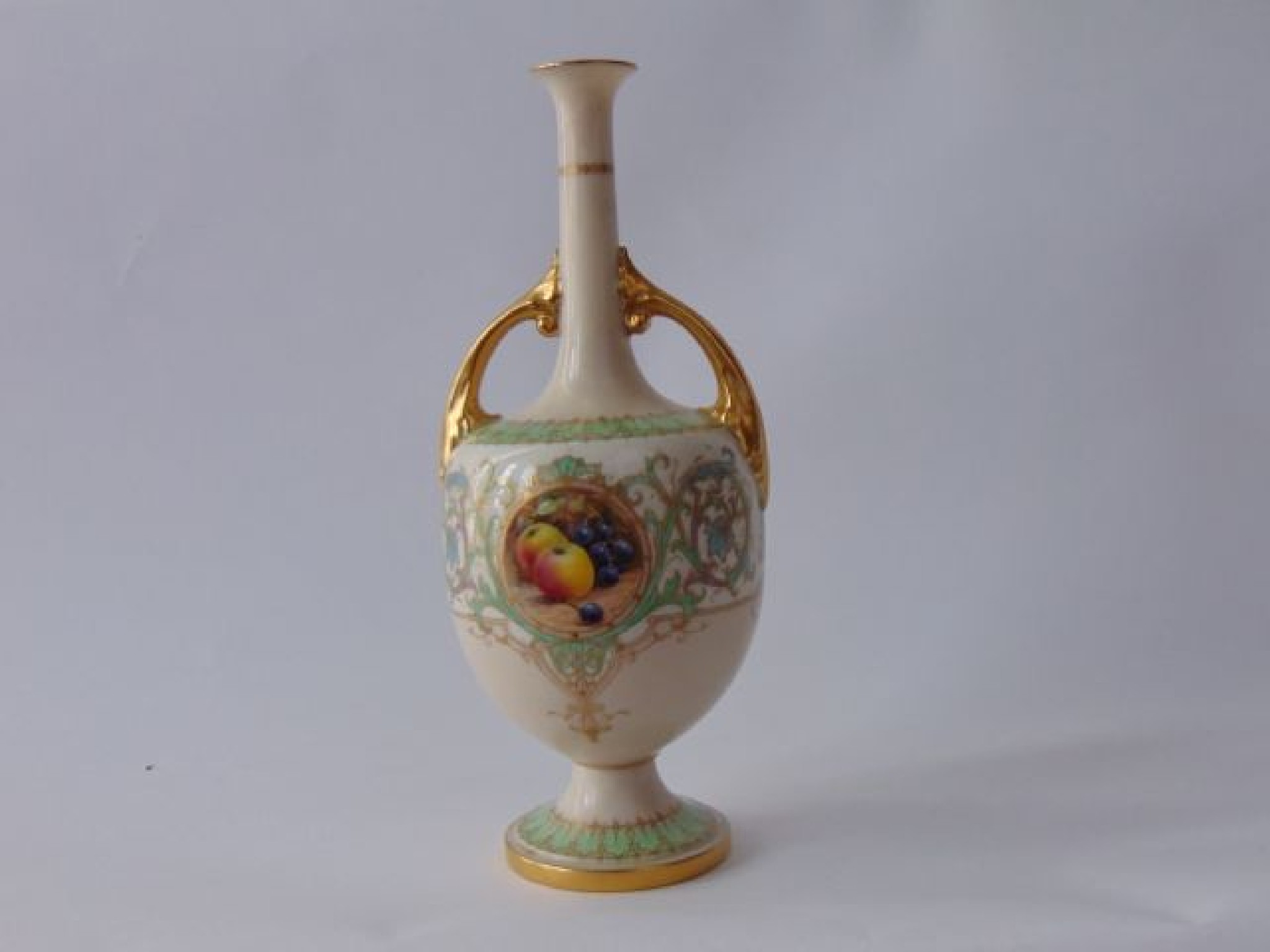 Appraisal: A Royal Worcester ivory ground two handled vase with drawn