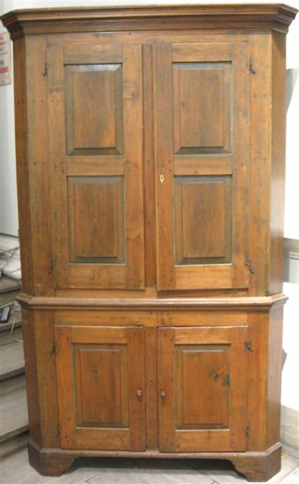 Appraisal: Cherry corner cupboard th century In two parts the upper