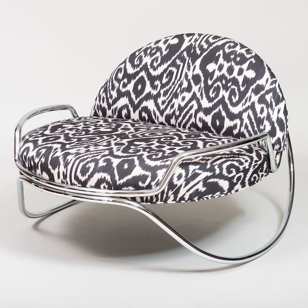 Appraisal: Chrome Rocker Upholstered in an Ikat Pattern of Recent Manufacture