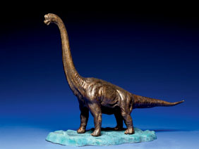 Appraisal: BRONZE SCULPTURE OF CAMAROSAURUS By Victor M Pracas A well