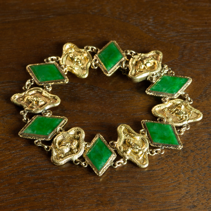 Appraisal: CHINESE JADE AND FOURTEEN KARAT GOLD BRACELET measuring - inches