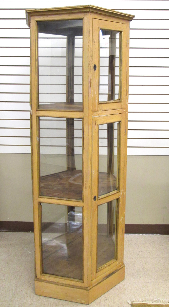 Appraisal: HEXAGONAL GLASS AND PAINTED WOOD DISPLAY CABINET the interior divided