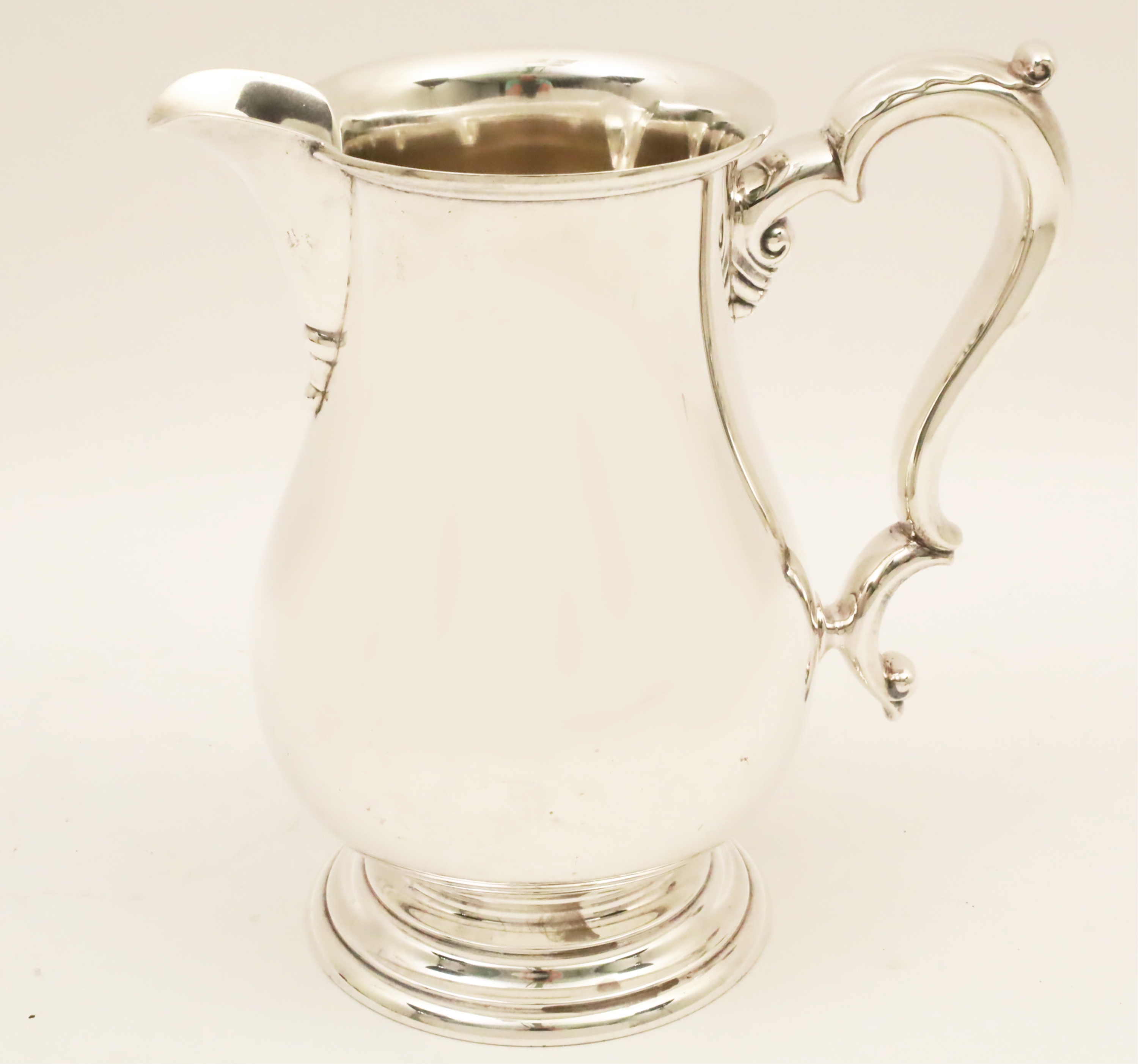 Appraisal: INTERNATIONAL STERLING WATER PITCHER International sterling silver water pitcher troy