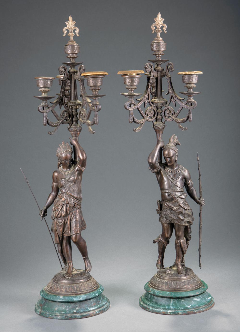 Appraisal: Pair of Antique French Patinated Metal Figural Four-Light Candelabra th