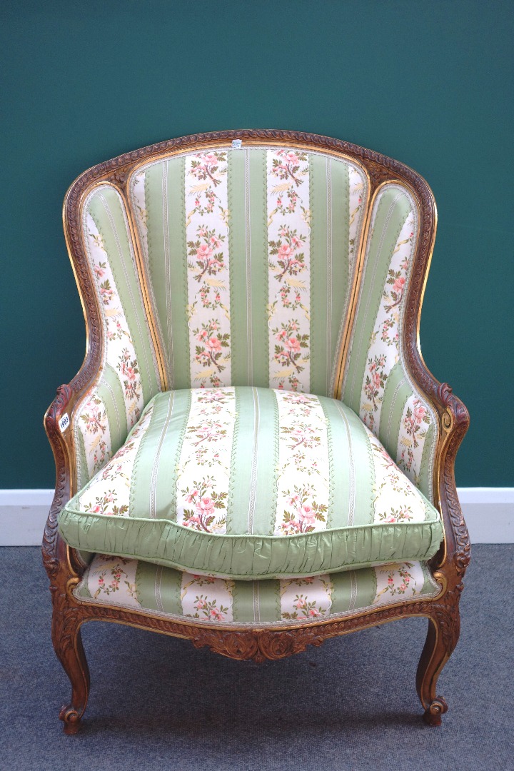 Appraisal: A Louis XV style tub back armchair with serpentine seat