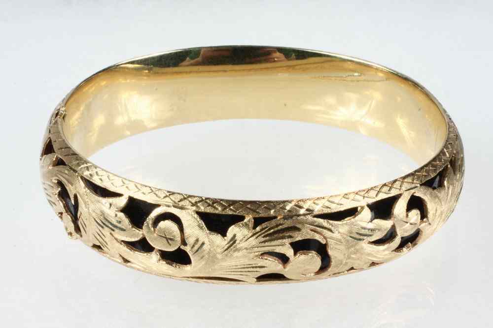 Appraisal: BANGLE BRACELET - One K yellow gold and black enamel