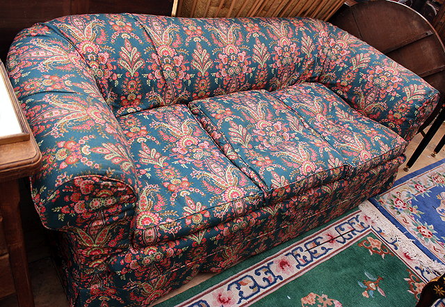 Appraisal: AN EARLY TH CENTURY ROLLOVER TOP CHESTERFIELD THREE SEATER SETTEE